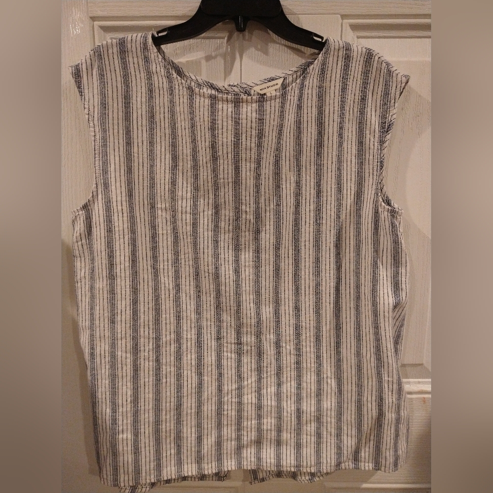 Top with buttons in the back. 26 x 21